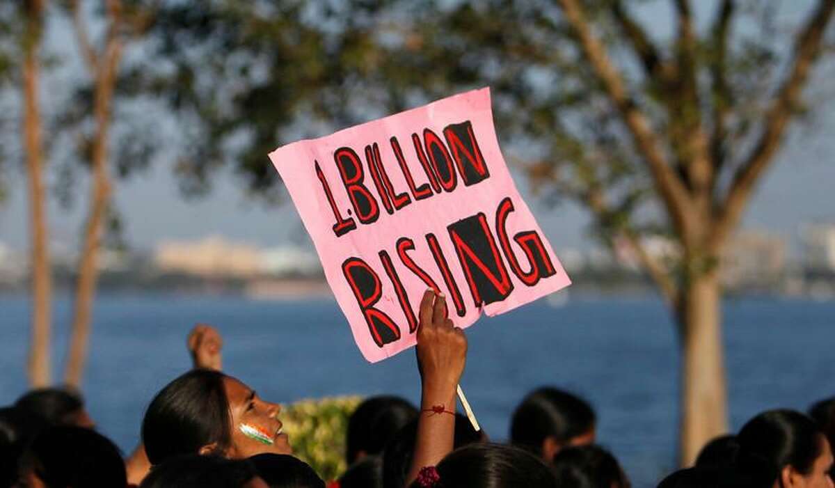 Women participate in an event to support the "One Billion Rising" global campaign in Hyderabad, India, Thursday, Feb. 14, 2013. Thousands of women and children in various cities in the country danced in the streets, in malls and other places to express support for the One Billion Rising movement, a worldwide call to end violence against women and girls. (AP Photo/Mahesh Kumar A.)