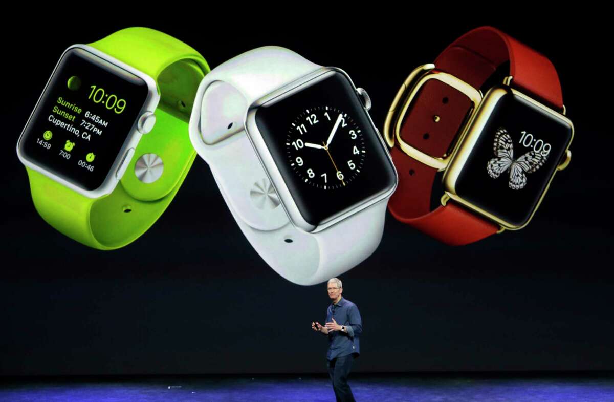 Apple CEO Tim Cook discusses the new Apple Watch in Cupertino, Calif., on Tuesday.