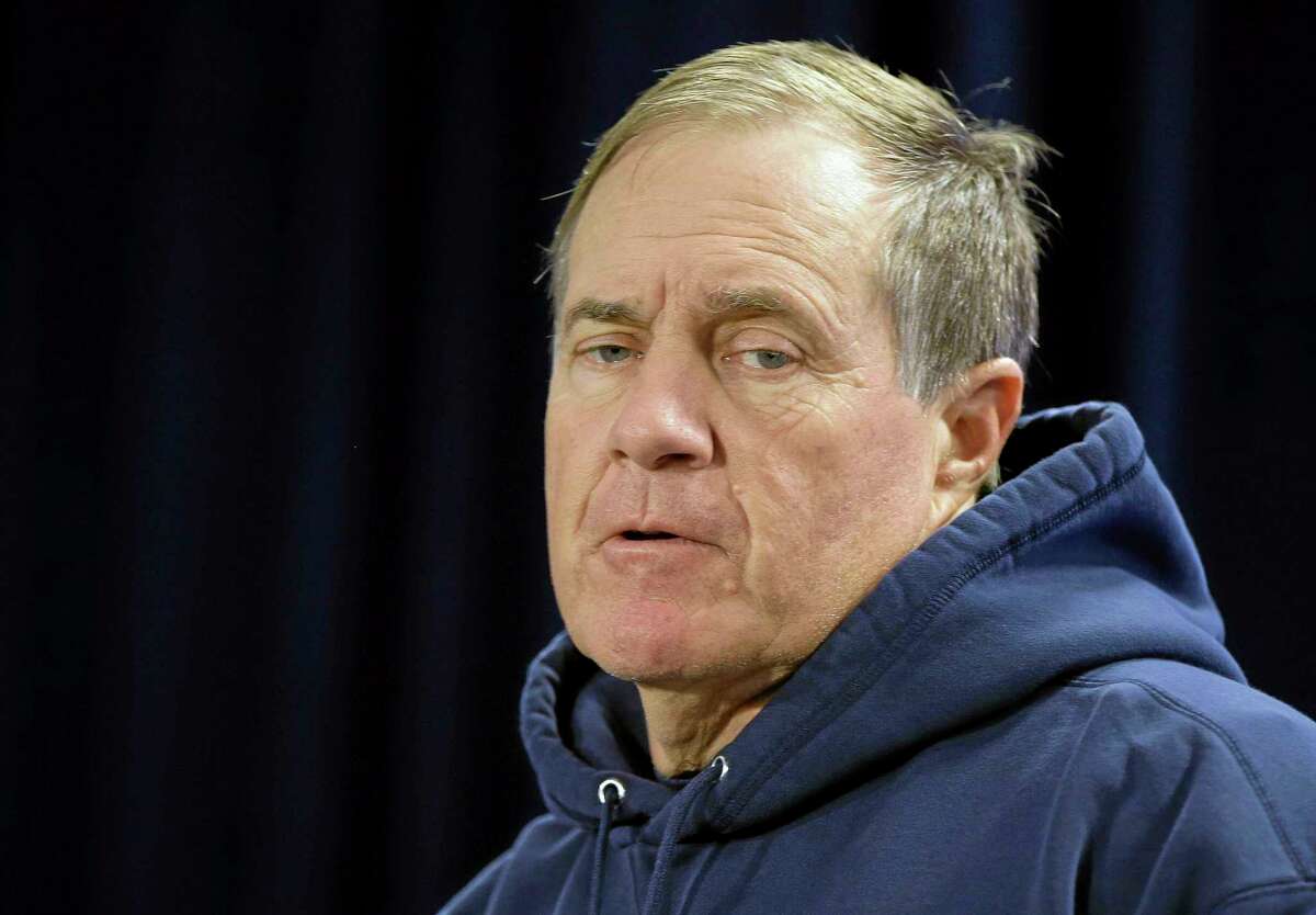 Patriots head coach Bill Belichick responds to a reporter’s question during a media availability session this week.