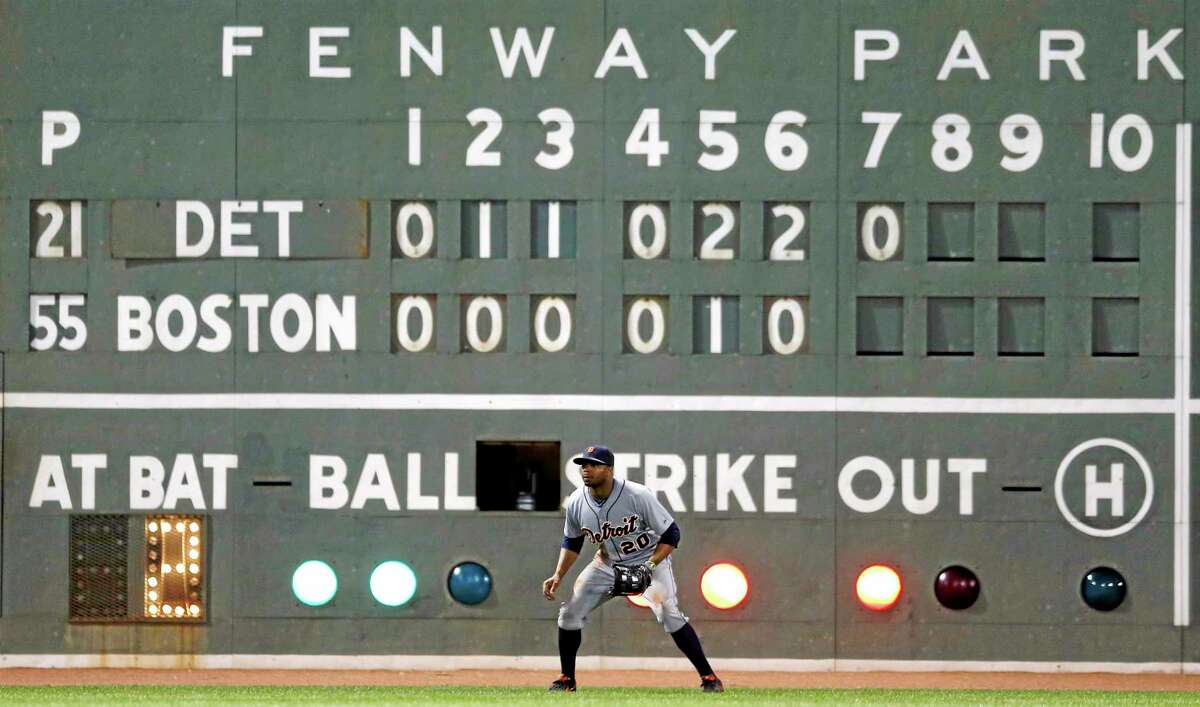 The scoreboard at Fenway Park shows the Tigers leading the Red Sox 6-1 in the seventh inning on Saturday.