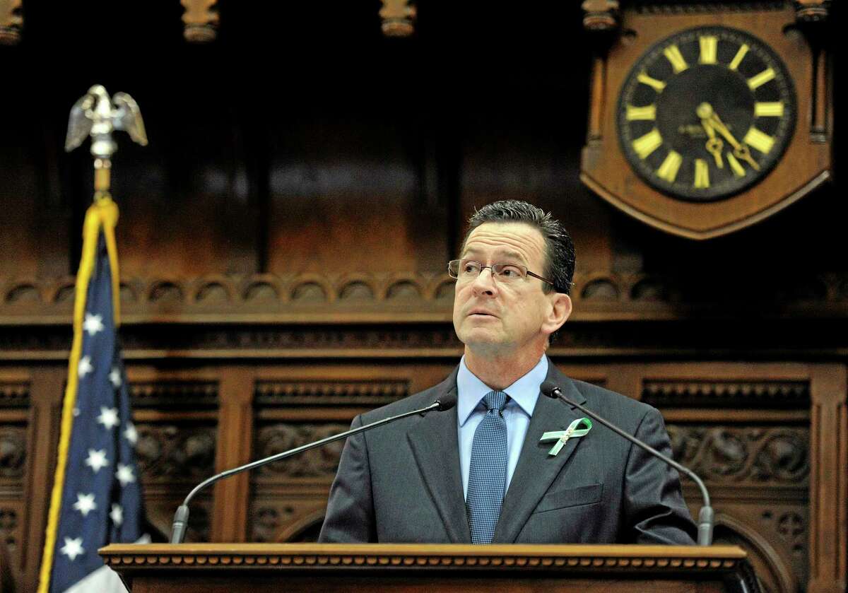 Connecticut Gov. Dannel P. Malloy addresses the House of Representatives and Senate during a memorial service for the victims of the Sandy Hook Elementary School shooting before a special session at the state Capitol in Hartford, Conn., Wednesday, Dec. 19, 2012. A gunman opened fire killing 26 people, including the principal and 20 children, at the school in Newtown before killing himself on Dec. 14. (AP Photo/Jessica Hill)