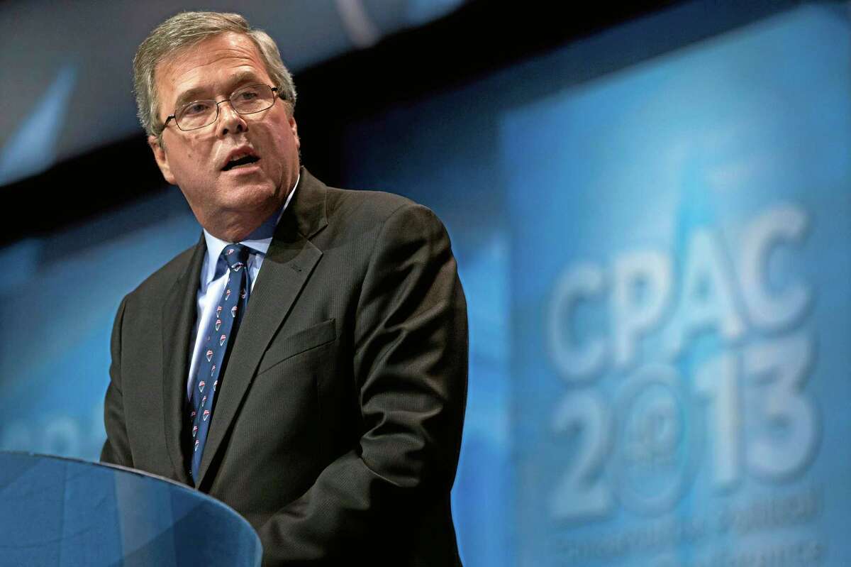 FILE - In this March 15, 2013 file photo, former Florida Gov. Jeb Bush speaks during the Ronald Reagan Dinner at the 40th annual Conservative Political Action Conference in National Harbor, Md. Weighing in while hosting an education conference in Boston, the potential 2016 presidential candidate argued that congressional Republicans represent “the mirror opposite” of the successes of GOP governors outside the capital. (AP Photo/Jacquelyn Martin, File)