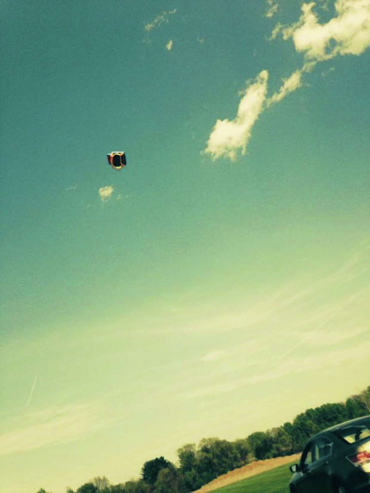 This Instagram photo, captured by a witness, shows the bounce house sent flying by a gust of wind, seriously injuring three children.