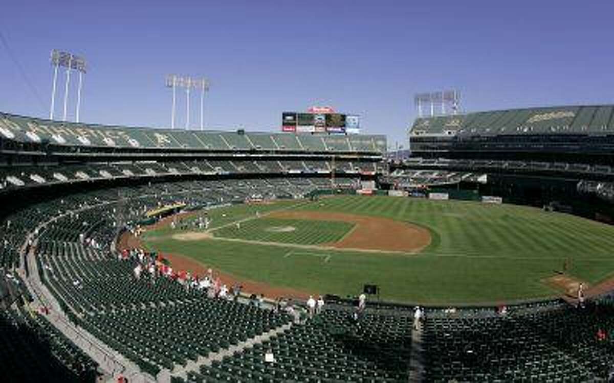 This Sept. 30, 2007 file photo shows O.Co Coliseum, then called McAfee Coliseum, home of the Oakland Athletics baseball team, in Oakland, Calif.