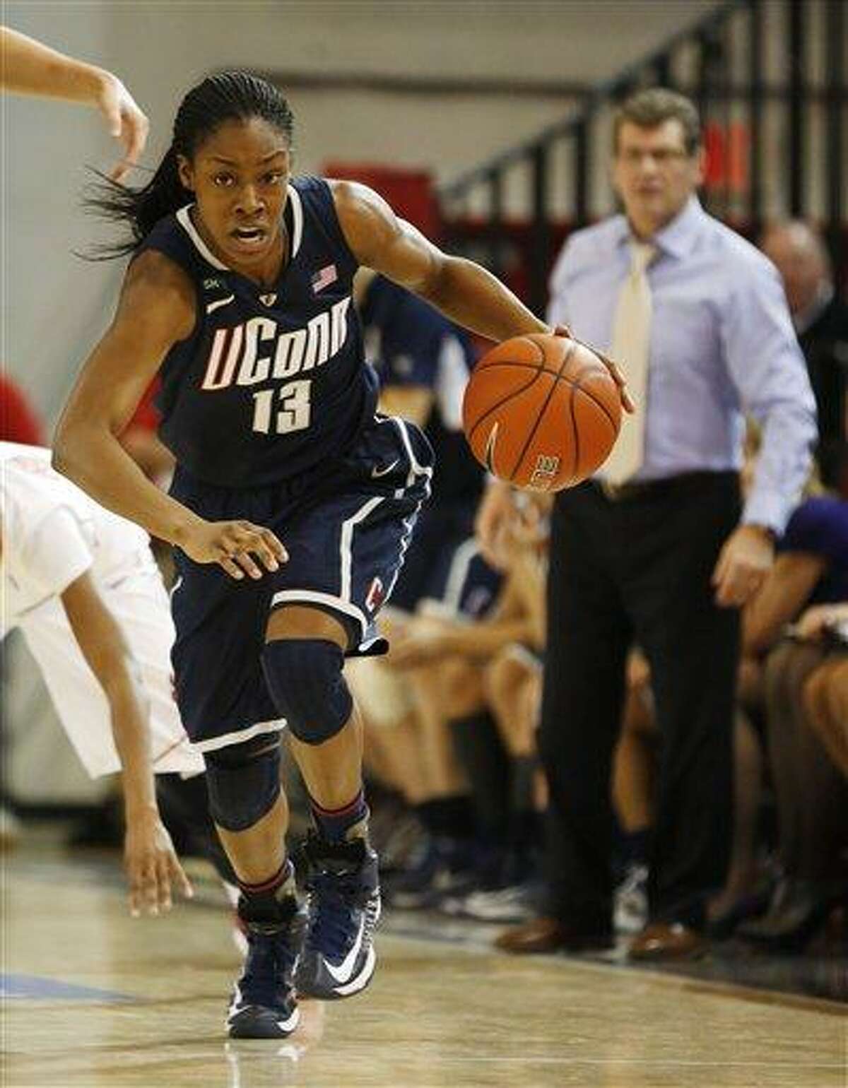 Connecticut guard Brianna Banks (13) breaks away during the first half of a NCAA college basketball game against St. John's, Saturday, Feb. 2, 2013, at St. John's University in New York. (AP Photo/John Minchillo)