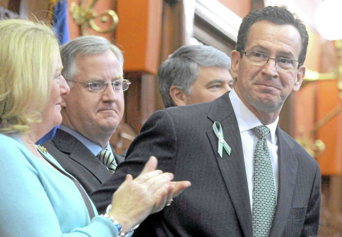 Gov. Dannel P. Malloy after his biennial budget address to the CT state legislature in February. His wife Cathy is at left, then House Speaker Brendan Sharkey, D-88, Senate President Pro Tempore Donald Williams, Jr. D-29.