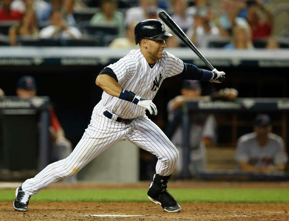 The Yankees’ Derek Jeter leaves the batter’s box with a fifth-inning RBI single during a game against the Boston Red Sox at Yankee Stadium in New York on Tuesday.
