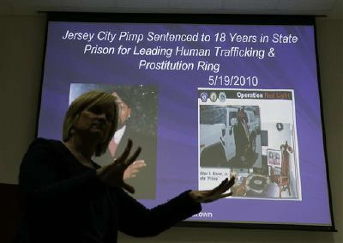 Kathleen Friess gives a presentation on human trafficking in Hamilton Township, N.J., for hotel and nightclub employees and tries to clarify notions of what human trafficking looks like.