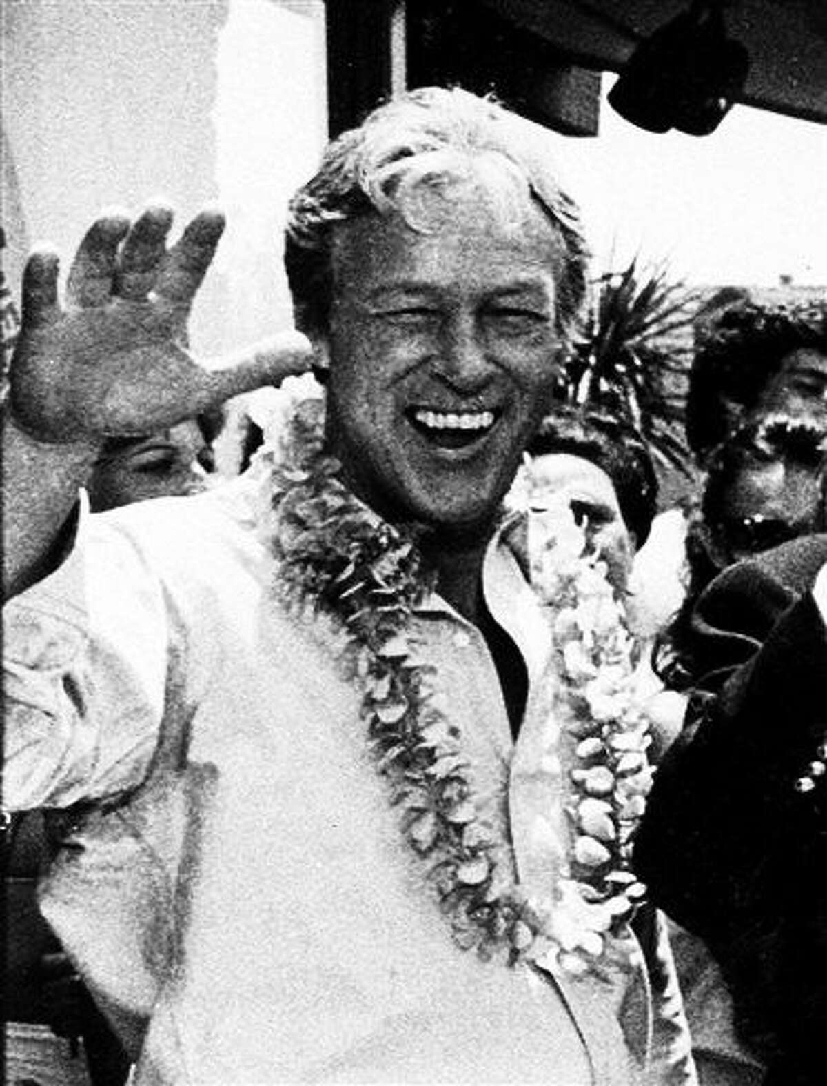 FILE - This Oct. 2, 1978 file photo shows Russell Johnson, as the professor, posing during filming of a two-hour reunion show, "The Return from Gilligan's Island," in Los Angeles. Johnson died Thursday, Jan. 16, 2014, at his home in Washington State of natural causes. He was 89. (AP Photo/Wally Fong, File)