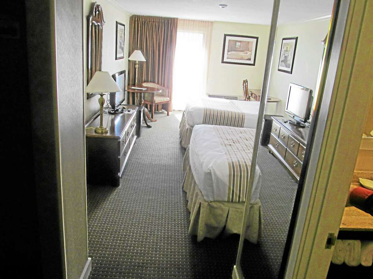 The inside of a room at the Interlaken Inn, Salisbury, where a Newtown police officer’s wife allegedly fired her husband’s gun at the wall on Nov. 16, 2013. The bullet hole was later patched up by a staff member of the inn.