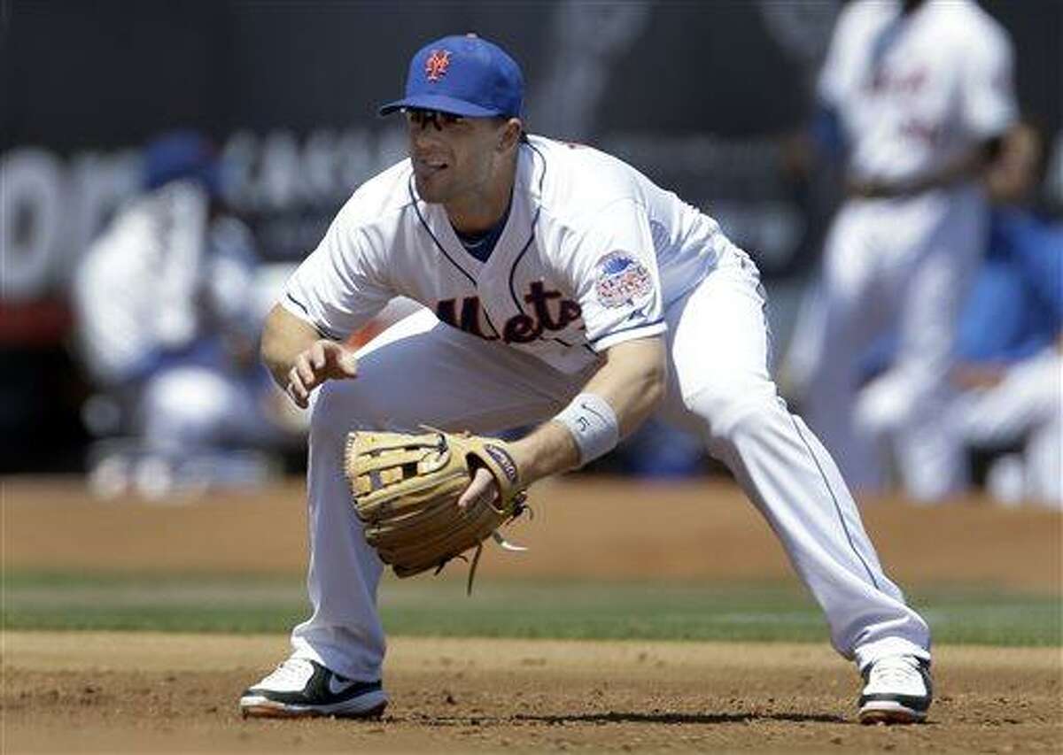New York Mets third baseman David Wright works at his position during the second inning of an exhibition spring training baseball game against the St. Louis Cardinals Friday, March 29, 2013, in Port St. Lucie, Fla. (AP Photo/Jeff Roberson)