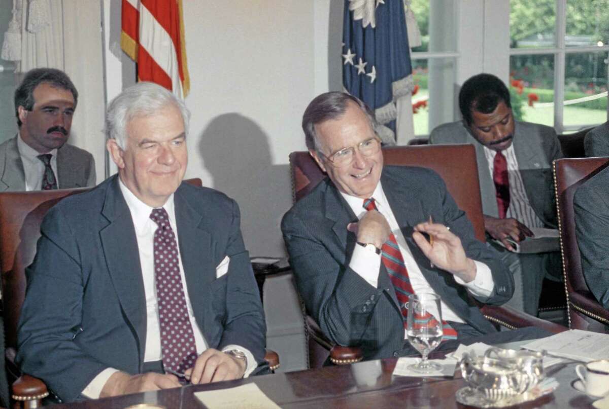 FILe - In this June 6, 1989 file photo, House Speaker Tom Foley of Washington sits next to U.S. President George H. Bush during a meeting with the congressional leadership at the White House in Washington. Foley has died at the age of 84, according to House Democratic aides on Friday, Oct. 18, 2013, who spoke on condition of anonymity. Foley was a Washington state lawmaker who became the first speaker since the Civil War who failed to win re-election in his home district. He was U.S. ambassador to Japan for four years during the Clinton administration. But he spent the most time in the House, serving 30 years including more than five as speaker.(AP Photo/Rick Bowmer, file)