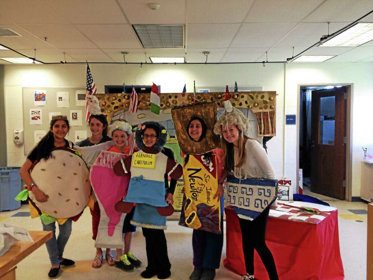 The Har-Bur Middle School Odyssey of the Mind Team: (from left to right) Sasha Ahmed, Lauren Alvarez, Aiden O’Conner, Lucy Gottfried, Alisha Petrosky, and Tanya Weingart in their costumes from the food court section of their play.