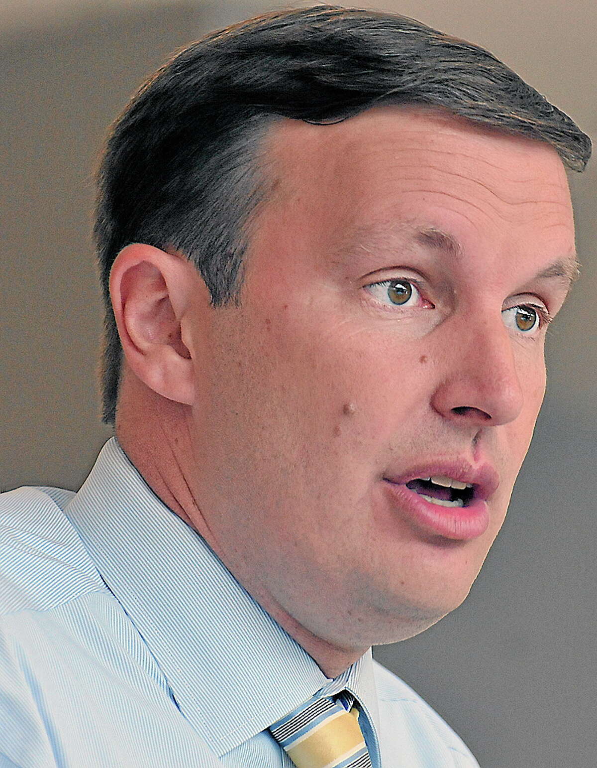 Wallingford-- U.S. Sen. Chris Murphy speaks to employees and media at Proton OnSite, a Wallingford based company that develops Hydrogen Generation Systems. Peter Casolino/New Haven Register 8/15/12