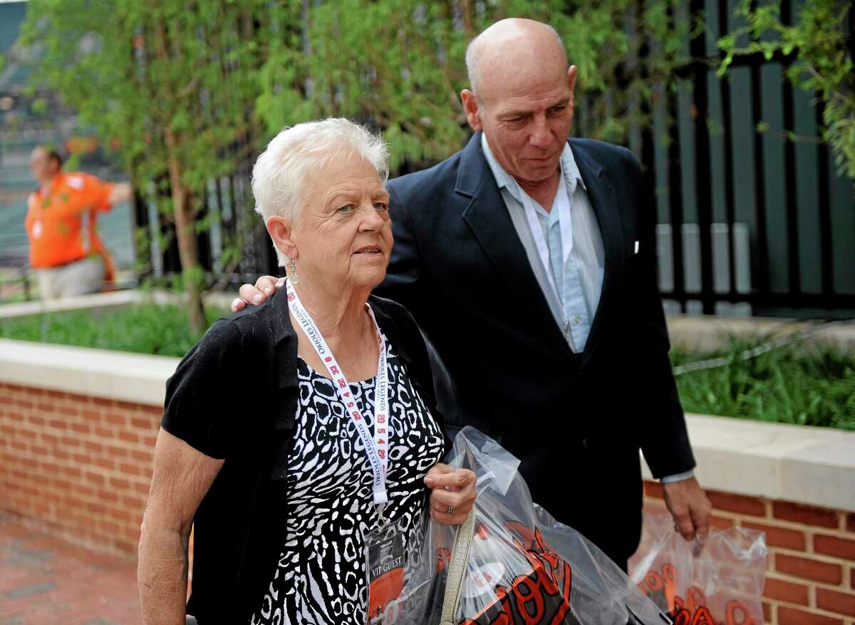 In a Sept. 6, 2012 file photo, Vi Ripken, mother of former Orioles legend and Hall of Famer Cal Ripken Jr., arrives at a ceremony to unveil his statue in Baltimore. On Wednesday, police charged Jesse Brown, 33, with trying to carjack the 75-year-old on Tuesday in a bank parking lot in Aberdeen, Md. Ripken wasn’t hurt and went into the bank to report the crime, Aberdeen police spokesman Lt. Frederick Budnick said. Officers arrested Bowen about two hours later. On July 24, 2012, Ripken was taken from her Aberdeen home at gunpoint and returned unharmed 24 hours later. At that time, police released a sketch, photographs and a surveillance video that were believed to show a potential suspect. Budnick said Tuesday night that the two crimes do not appear to be related.