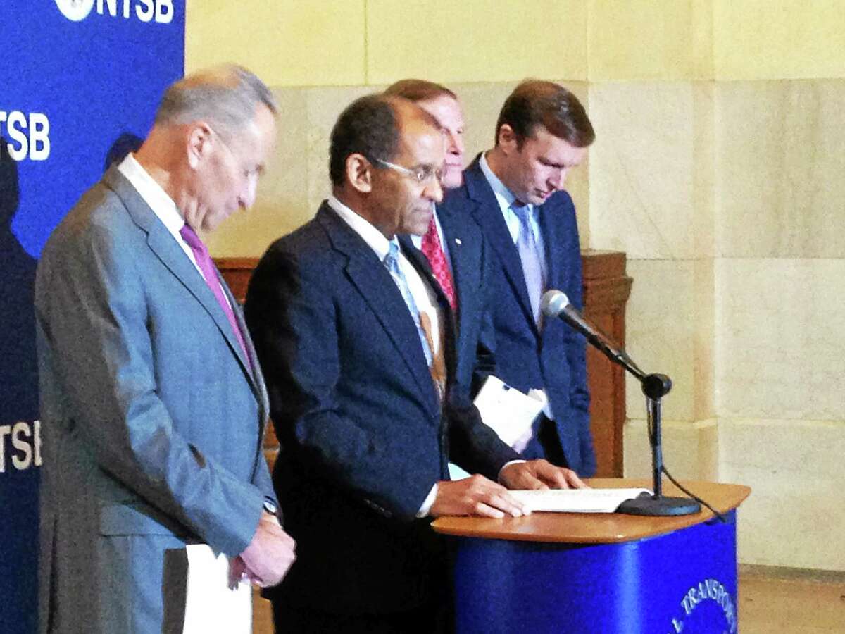 National Transportation Safety Board acting Chairman Christopher Hart, second from left, at a press conference Tuesday announcing the agency’s investigations of five Metro-North accidents since 2013. With him, from left, are U.S. Sens. Charles Schumer, D-N.Y., Richard Blumenthal, D-Conn., and Christopher Murphy, D-Conn.