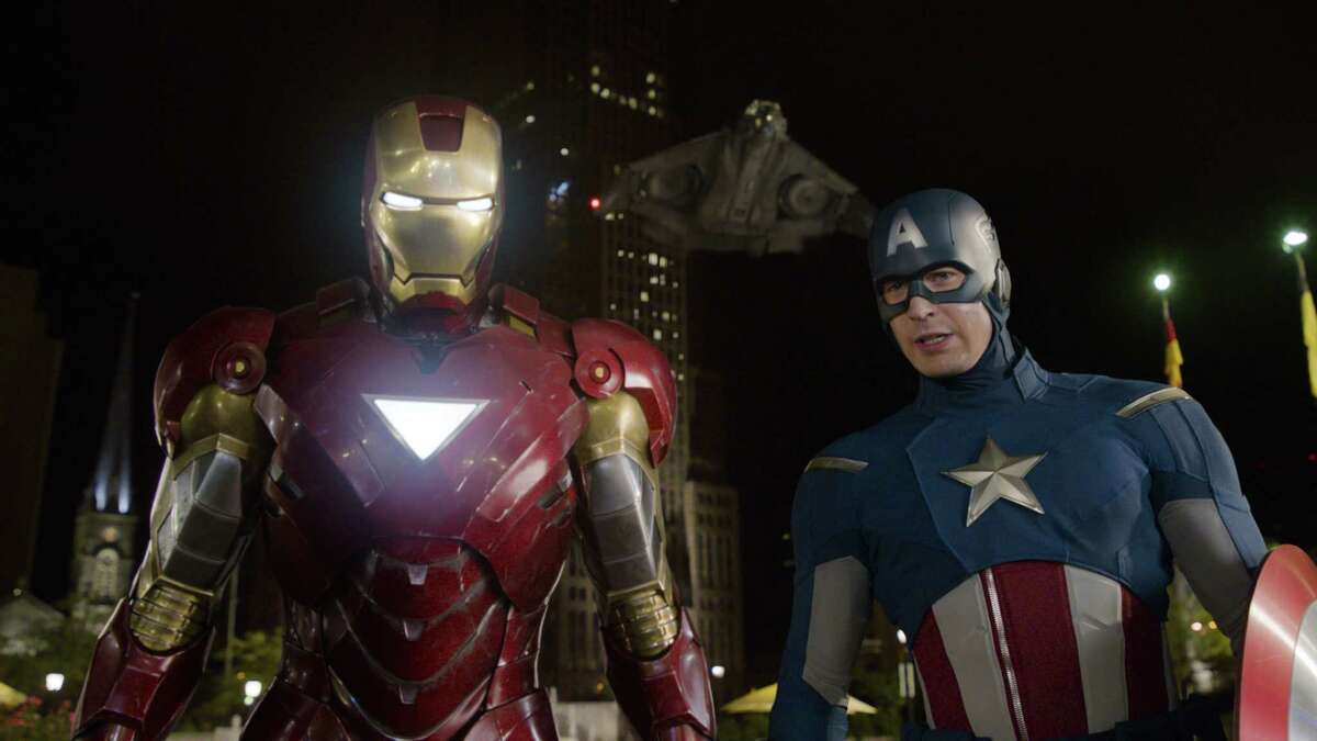 This film image released by Disney shows, Iron Man, portrayed by Robert Downey Jr., left, and Captain America, portrayed by Chris Evans, in a scene from "The Avengers." Ahead of the release of next yearís ìThe Avengers: Age of Ultronî and ìAnt-Man,î Marvel is hosting a special 45-minute presentation on Tuesday, Oct. 28, 2014, at the El Capitan Theatre in Hollywood. (AP Photo/Disney)