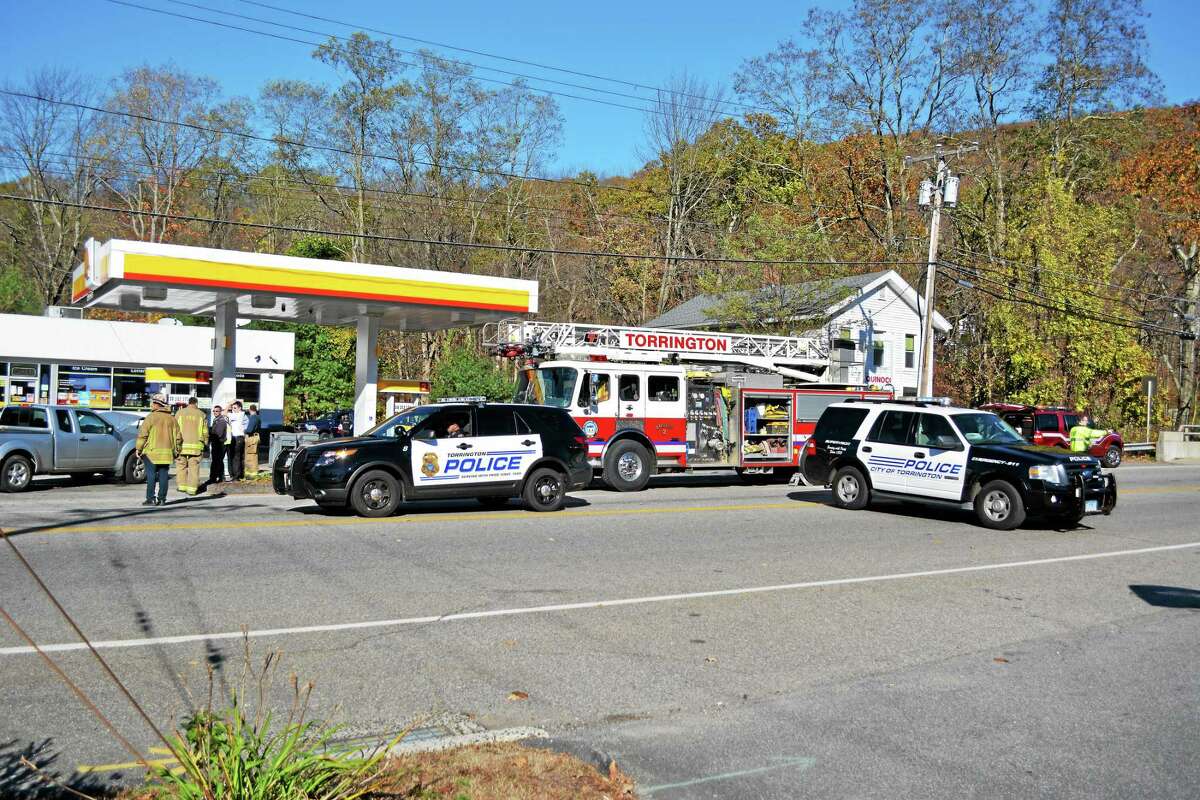Police and fire personnel responded to the scene of a two-car crash Monday and blocked off a section of the road along Route 4 while crews accessed the damage to a gas pump that was struck in the accident.