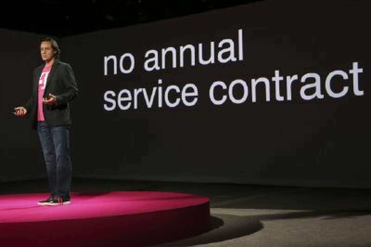 T-Mobile CEO John Legere speaks during a news conference Tuesday, March 26, 2013 in New York.