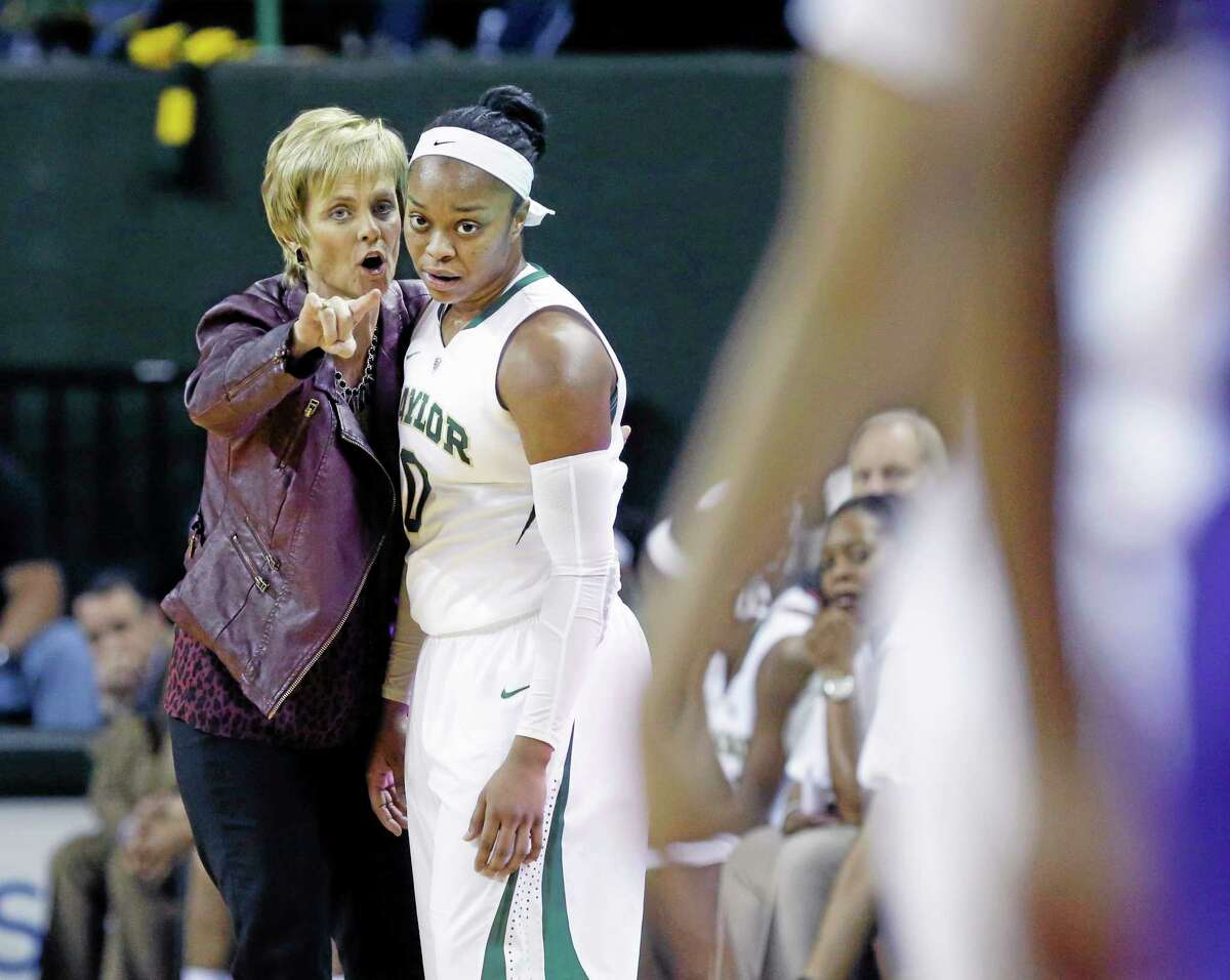 Coach Kim Mulkey, left, Odyssey Sims and the Baylor women’s basketball team play host to top-ranked UConn on Monday in Waco, Texas.