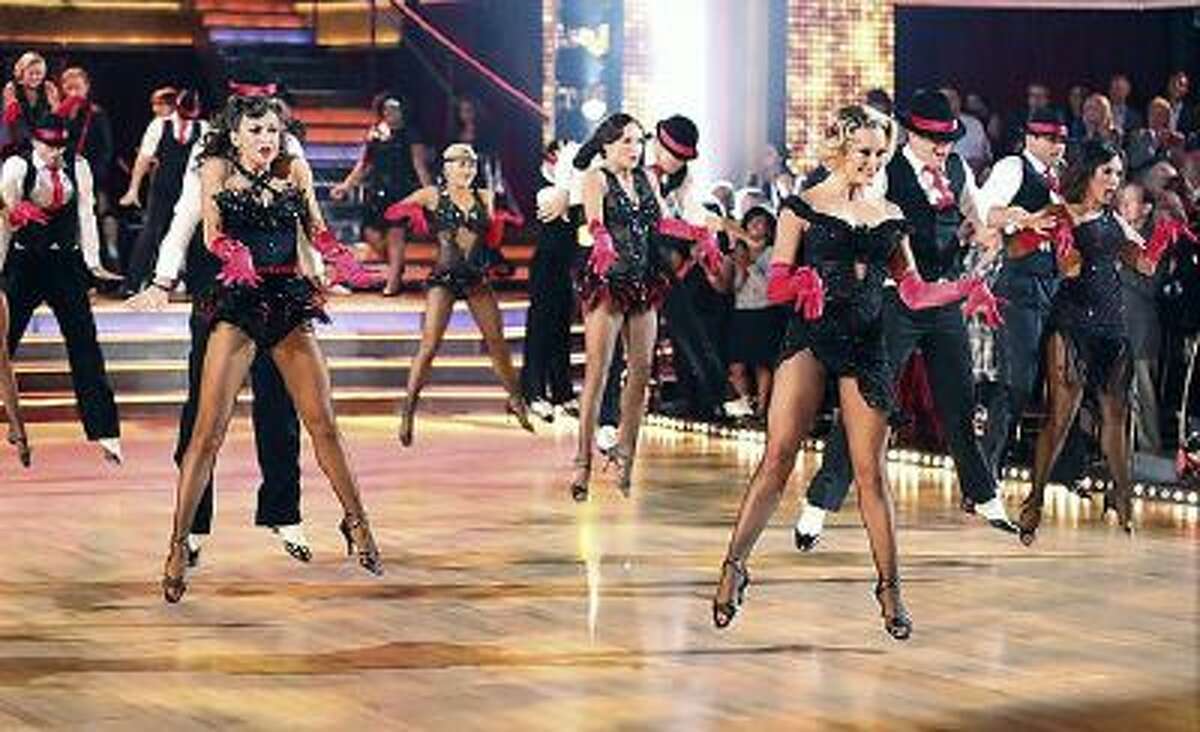 Cast members perform at the start of 'Dancing with the Stars' on Monday, September 30, 2013.