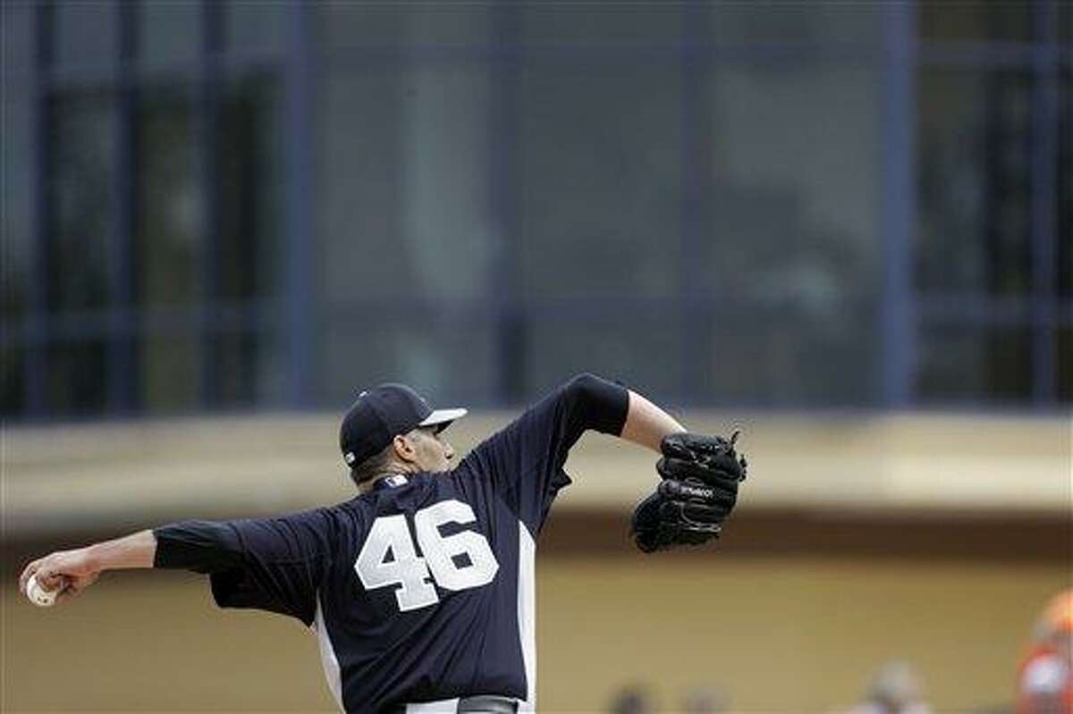 New York Yankees starting pitcher Andy Pettitte throws during an exhibition spring training baseball game against the Detroit Tigers, Saturday, March 23, 2013 in Lakeland, Fla. (AP Photo/Carlos Osorio)