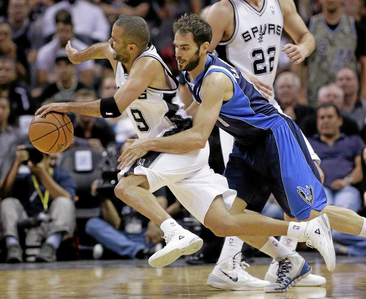 The Spurs’ Tony Parker is fouled by the Dallas Mavericks’ Jose Calderon during a first-round playoff game on April 30 in San Antonio.