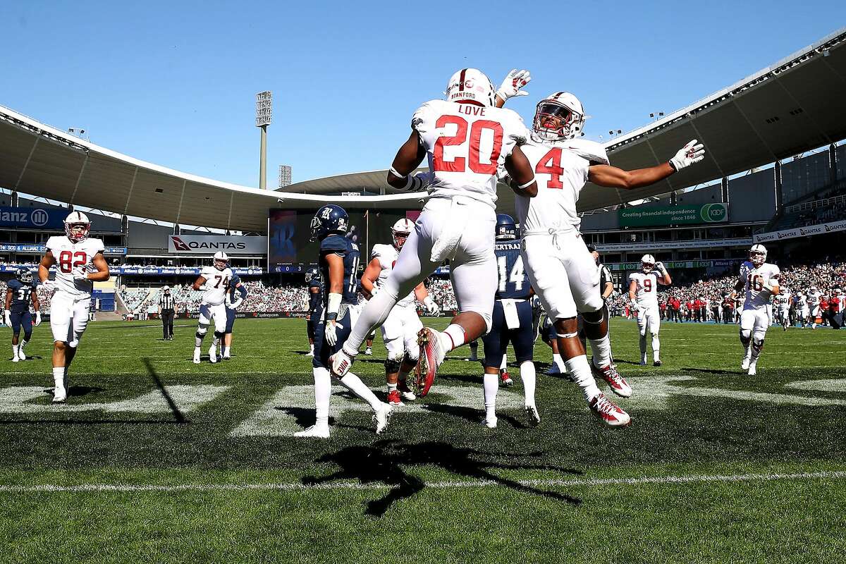 SYDNEY, AUSTRALIA - AUGUST 27: Bryce Love and Jay Tyler of Stanford celebrate Love scoring a touchdown during the College Football Sydney Cup match between Stanford University (Stanford Cardinal) and Rice University (Rice Owls) at Allianz Stadium on August 27, 2017 in Sydney, Australia. (Photo by Mark Kolbe/Getty Images)