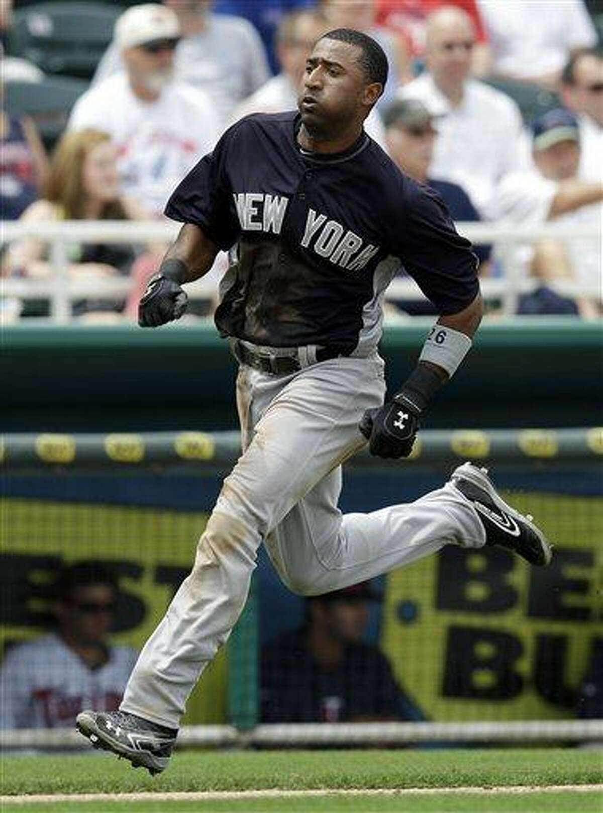 New York Yankees' Eduardo Nunez runs to home plate during an exhibition spring training baseball game against the Minnesota Twins in Fort Myers, Fla., Friday, March 22, 2013. (AP Photo/Elise Amendol12