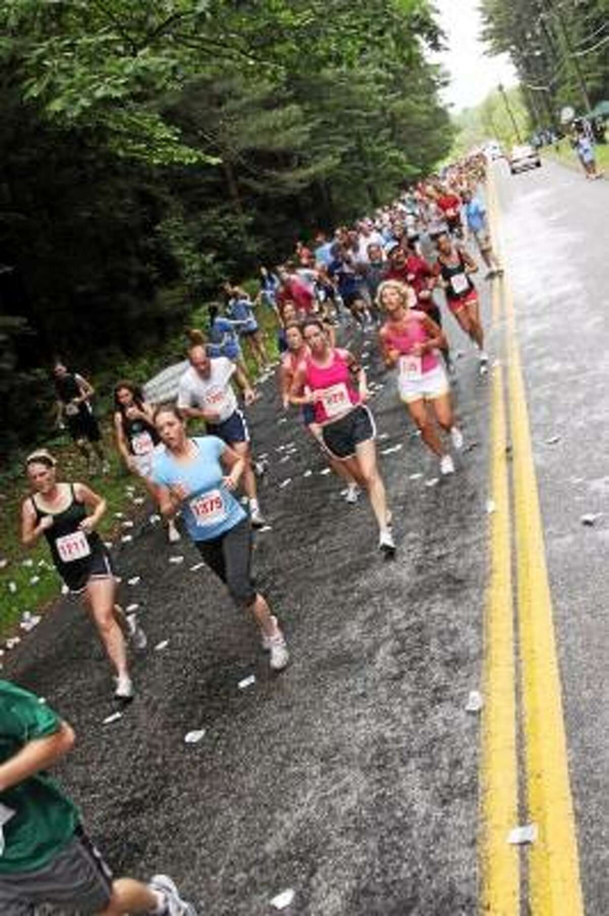 Register Citizen File Photos - Runners compete in the annual Litchfield Hills Road Race.