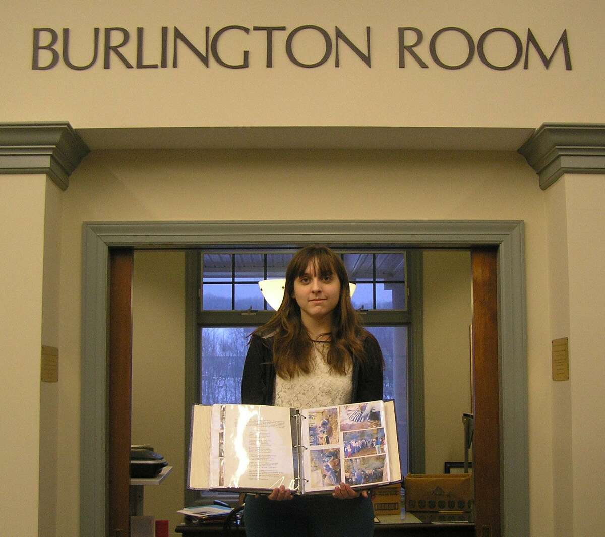 Submitted photo Michelle Jalbert shows the scrapbook project she completed for the Burlington Public Library on the town's role in the history of Girl Scouting.