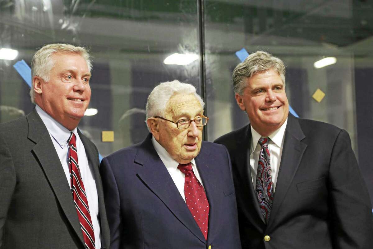 Diplomat and former Secretary of State Henry Kissinger speaks in Kent during the dedication of the Admiral James and Sybil Stockdale Ice Arena on Saturday. Taylor and Sidney Stockdale also spoke.