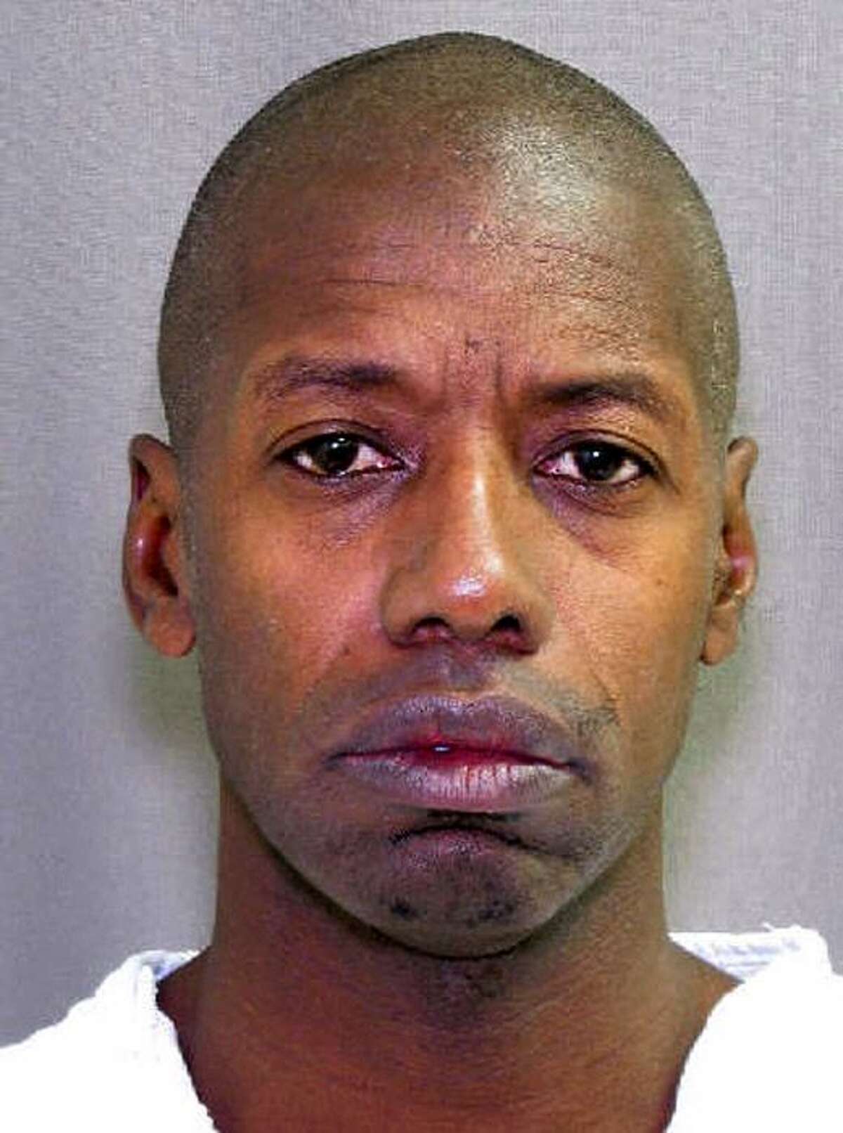 This undated handout photo provided by the Texas Department of Criminal Justice shows Darren Vann. Police say Vann, a suspect in the slayings of seven women whose bodies were found in northwestern Indiana over the weekend, is a former Texas resident who now lives in Gary. Hammond Police Chief John Doughty says Vann will be charged Monday in the slaying of a woman whose body was found Friday at a Motel 6 in Hammond. (AP Photo/Texas Department of Criminal Justice)