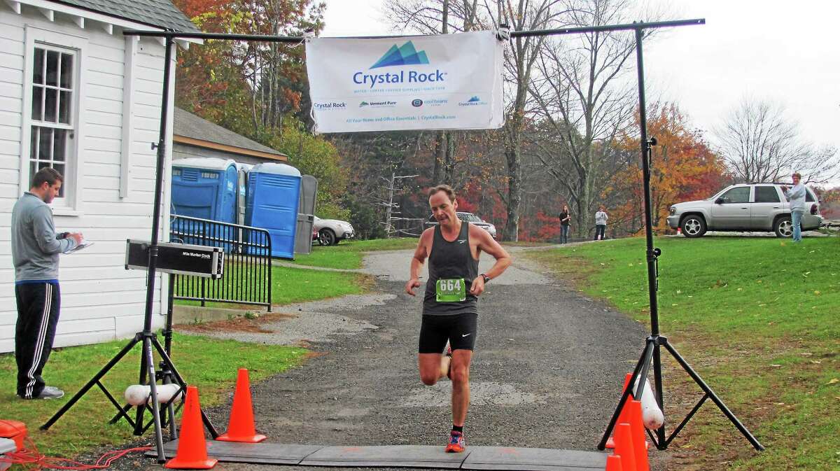 Justin Burchett, 41, of New York won the Warren Park and Recreation Cider Run 5K Saturday with a time of 18:54.