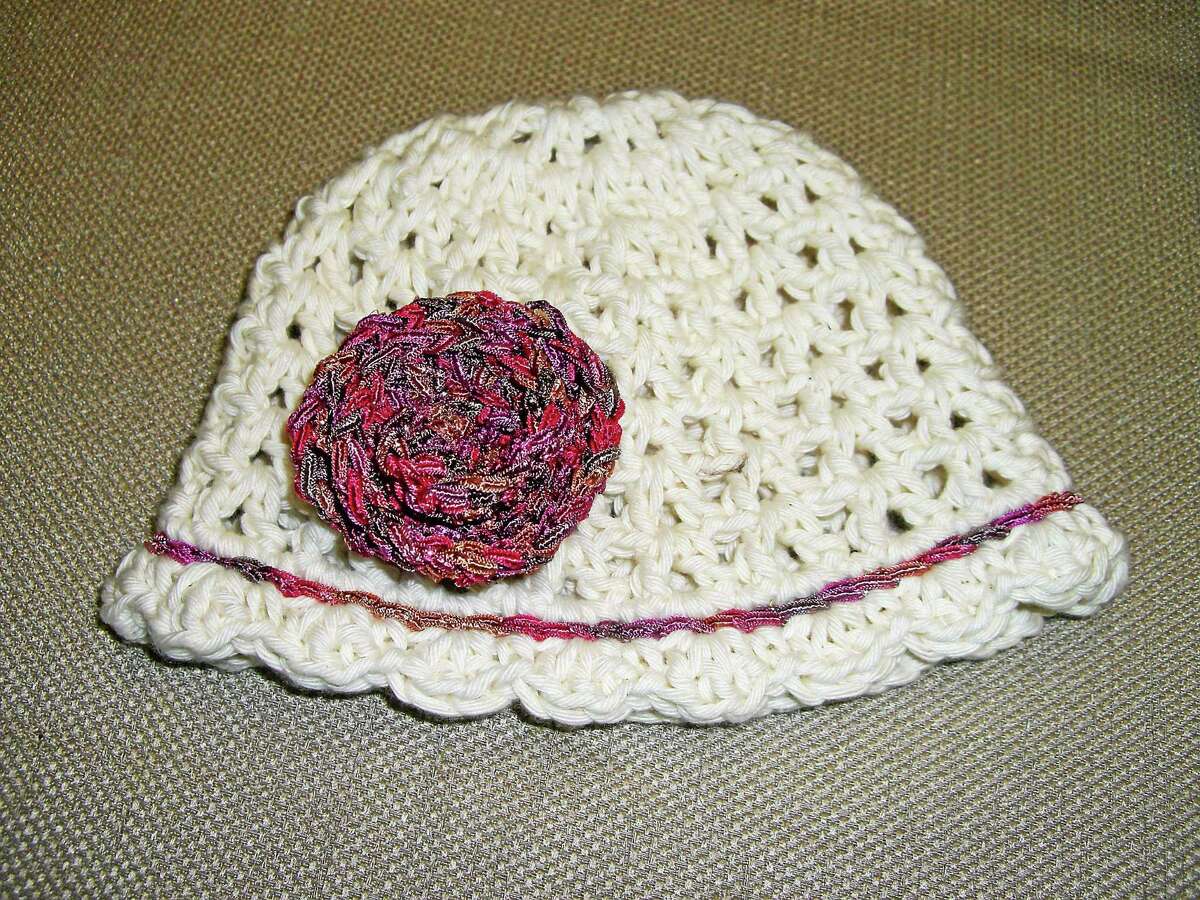 Submitted photo - Ginger Balch At a knit-along this Sunday in Newtown, knitters and crocheters will make hats to donate to local hospitals.
