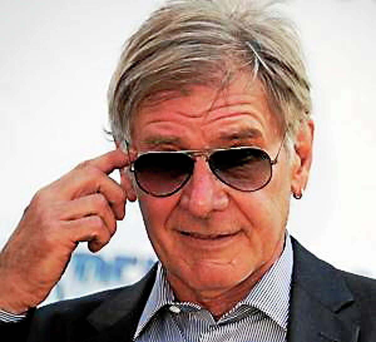 Harrison Ford during a photo call for The Expendables 3 at the 67th international film festival, Cannes, southern France, Sunday, May 18, 2014.