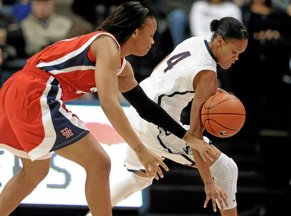 Jessica Hill — The Associated Press UConn’s Moriah Jefferson steals the ball from Houston’s Jessieka Palmer, left, during Tuesday’s game.