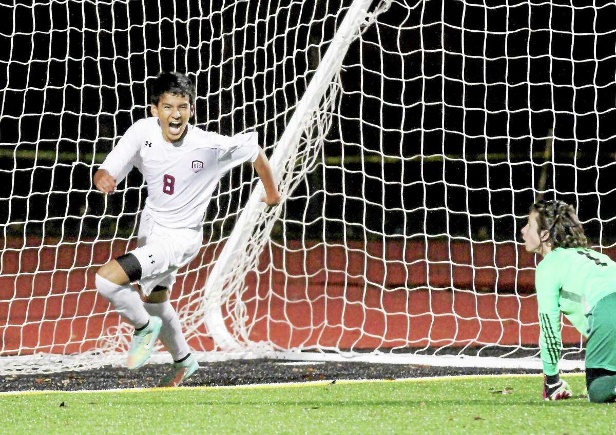 Torrington’s Kevin Vaca celebrates his second goal in the Red Raiders’ 5-2 win over Seymour Thursday night.