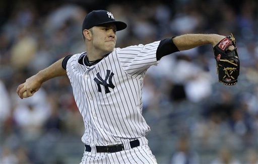 Cleveland Indians relief pitcher Joba Chamberlain throws against