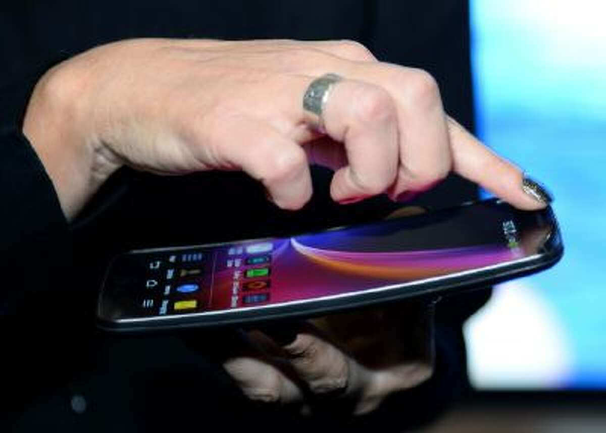 The LG Electronics LG G Flex phone is shown at a press event at the Mandalay Bay Convention Center for the 2014 International CES on January 5, 2014 in Las Vegas, Nev.