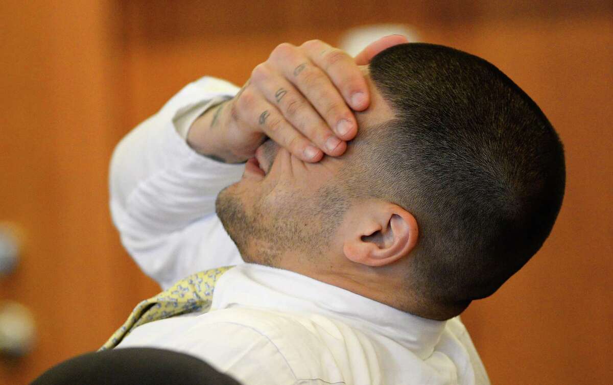 Former New England Patriots football player Aaron Hernandez rubs his eyes during an evidentiary hearing at Bristol County Superior Court on Oct. 2 in Fall River, Mass.