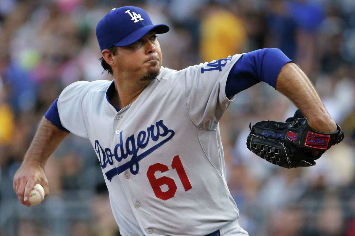 Dodgers pitcher Josh Beckett says he is retiring after 14-year career