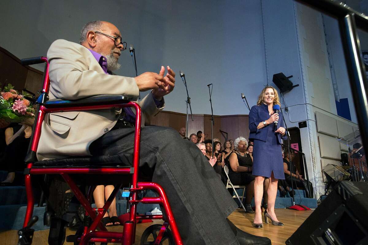 Glide Memorial Church co-founder Cecil Williams, left, introduces Karen Hanrahan, right, the church's new president and CEO, on Sunday, Aug. 27, 2017 in San Francisco, Calif. (D. Ross Cameron / Special to The Chronicle)
