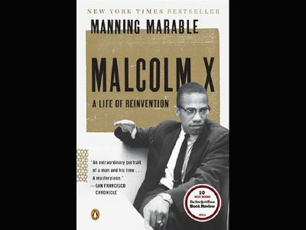 This book cover image released by Viking shows "Malcolm X: A Life of Reinvention" by Manning Marable.