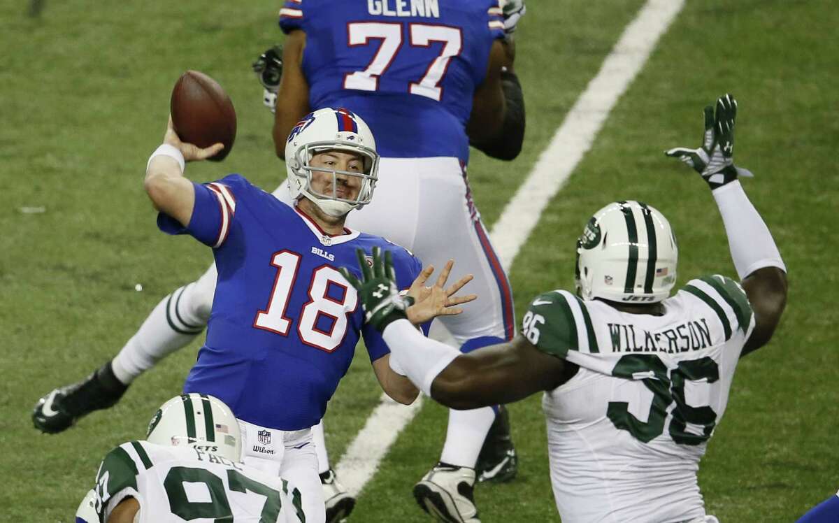 Buffalo Bills quarterback Kyle Orton throws while pressured by New York Jets defensive end Muhammad Wilkerson during Monday’s game in Detroit.