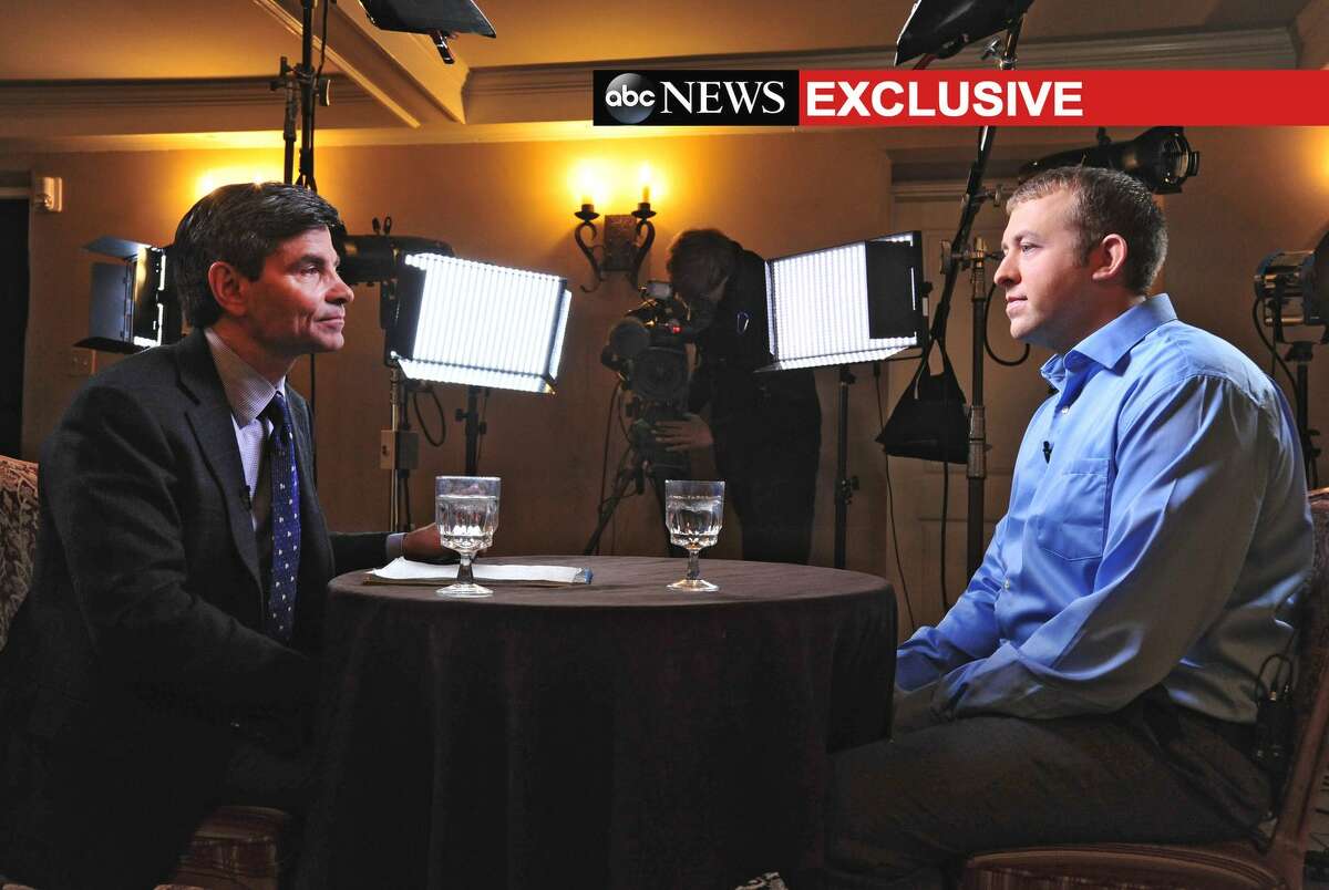 In this photo provided by ABC News, ABC News’ chief anchor George Stephanopoulos, left, interviews Ferguson, MO., police officer Darren Wilson, Tuesday, Nov. 25, 2014 in Missouri. The interview will air during ABC News programs and platforms on Nov. 25 and 26.