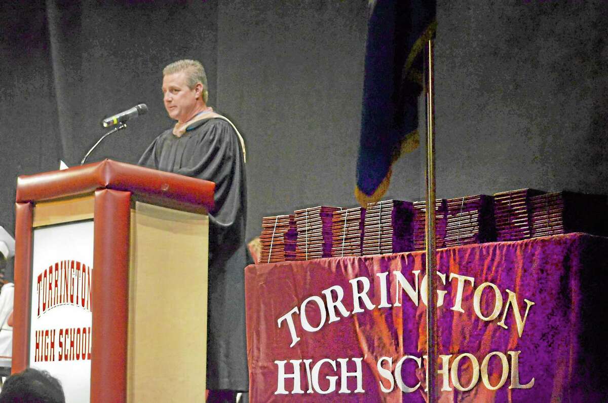 Ken Traub, school board chairman, speaks at the graduation ceremony for the Torrington High School class of 2013.