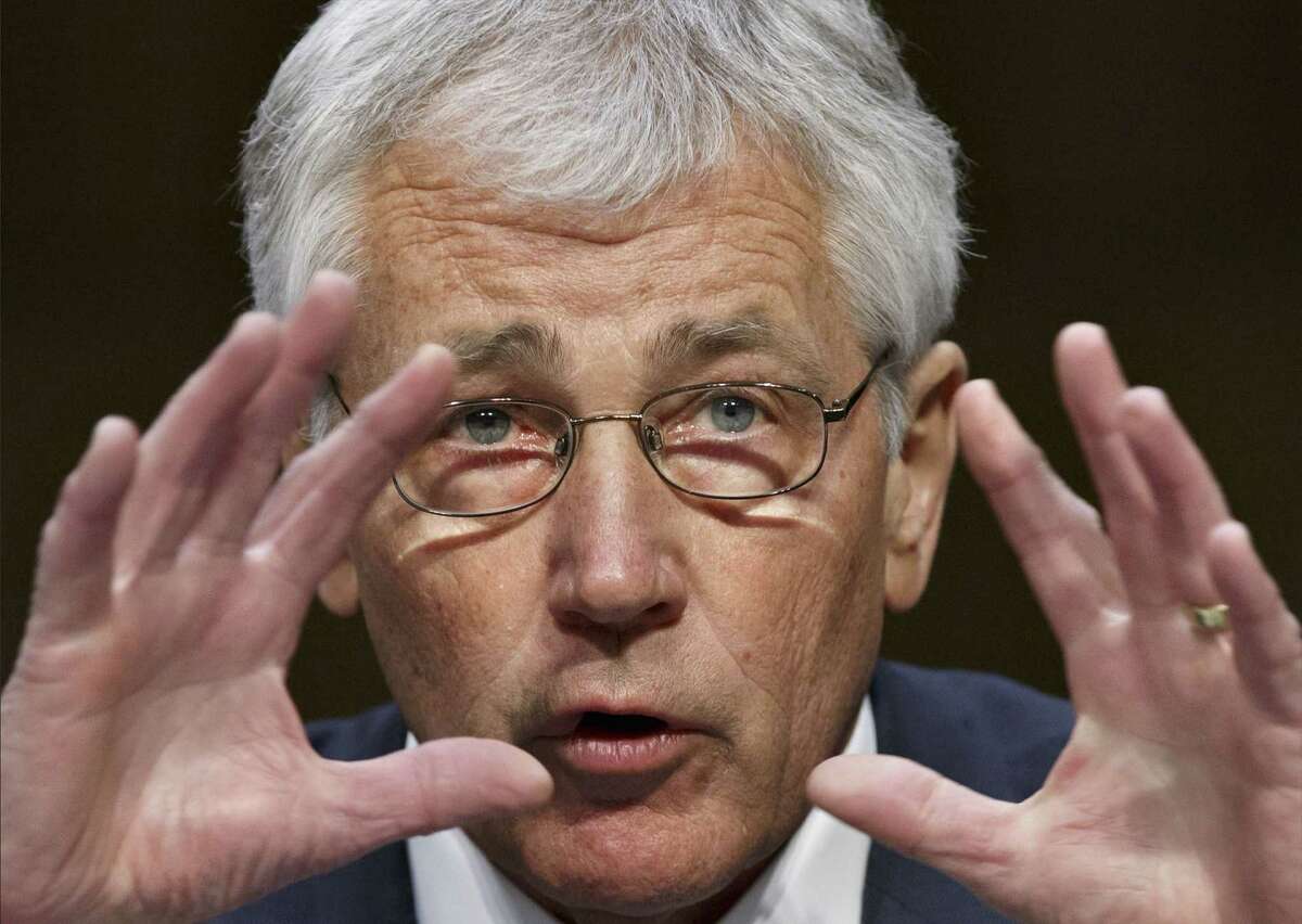 In this photo taken March 5, 2014, Defense Secretary Chuck Hagel appears at a Senate Armed Services Committee hearing on the Defense Department’s budget request for fiscal year 2015, on Capitol Hill in Washington.