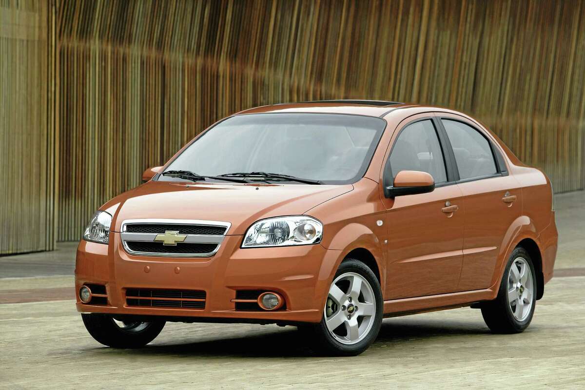 This undated file photo provided by General Motors shows the 2007 Chevrolet Aveo LT. General Motors on Wednesday, May 21, 2014 recalled 218,000 Chevrolet Aveo subcompact cars, model years 2004 through 2008. The daytime running light module in the dashboard center stack can overheat, melt and catch fire. (AP Photo/General Motors)