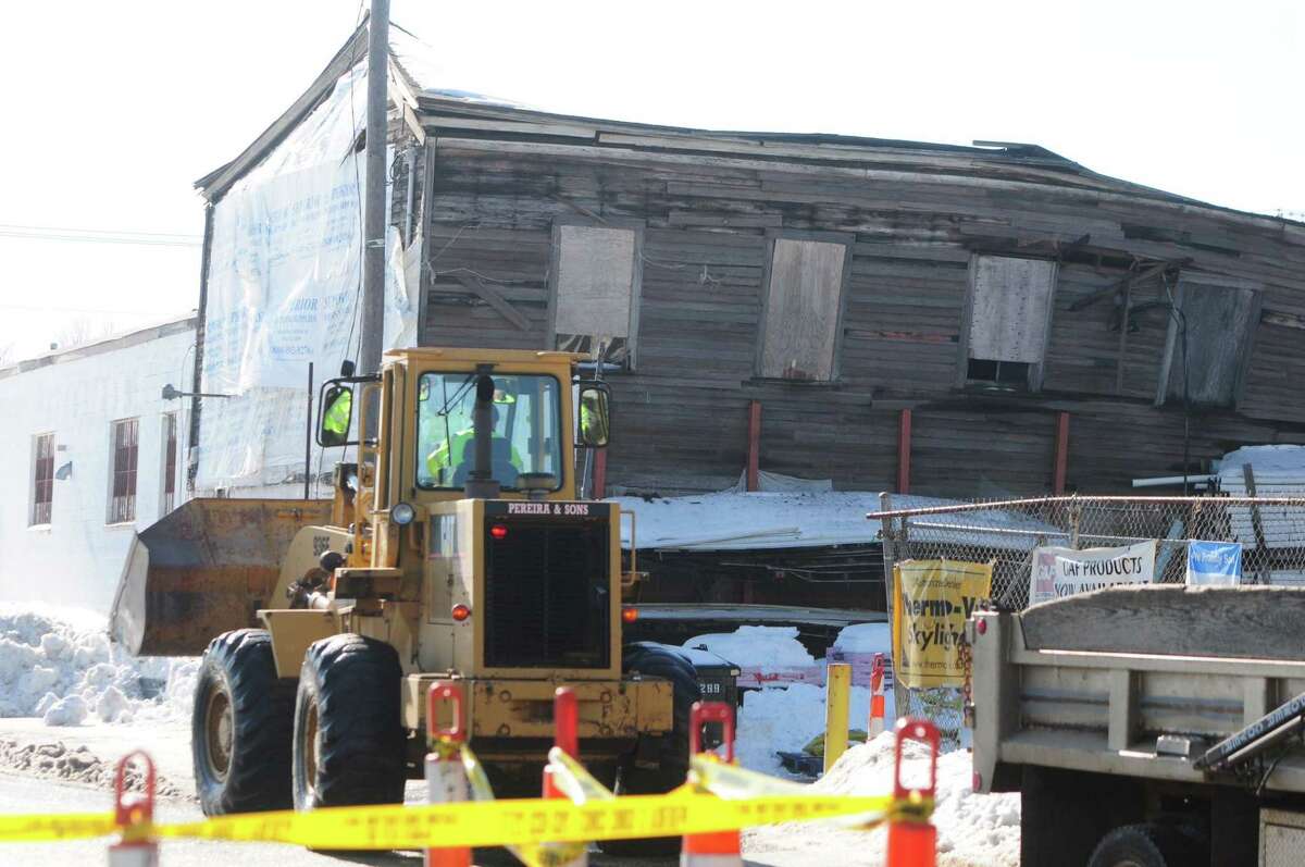 The roof of a former industrial building on Water Street in West Haven collapsed Wednesday evening.